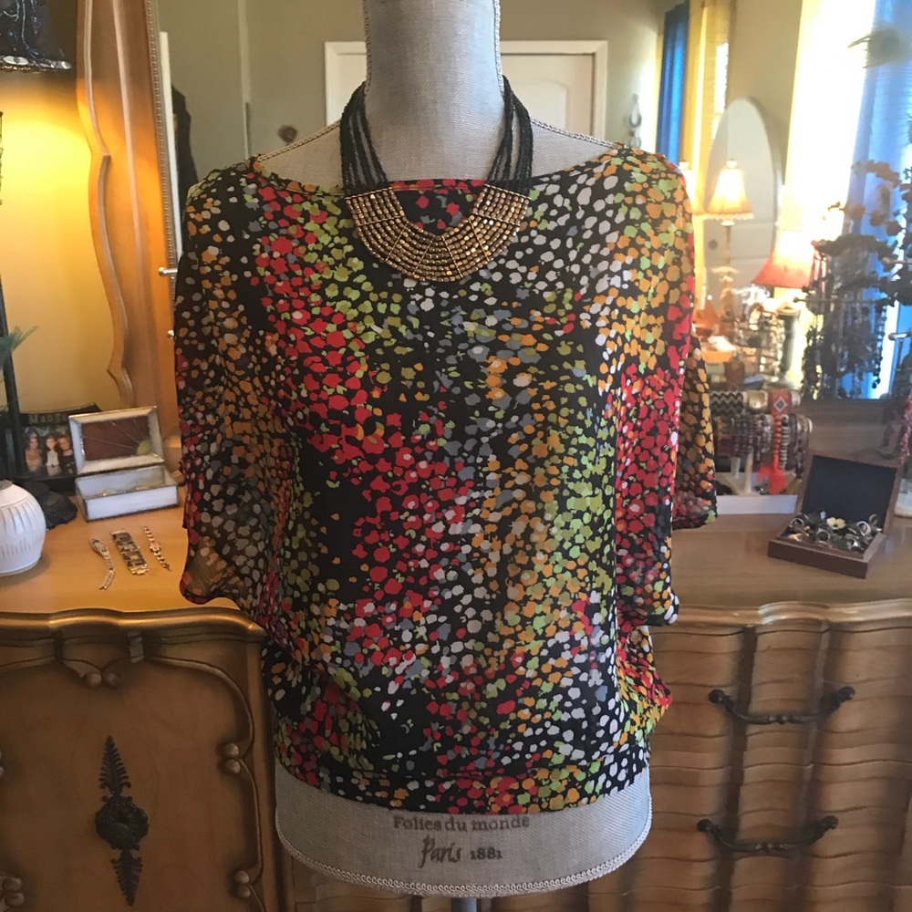 Women’s short sleeve, cold shoulder shirt